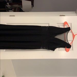 Black gown with some sheer portions.